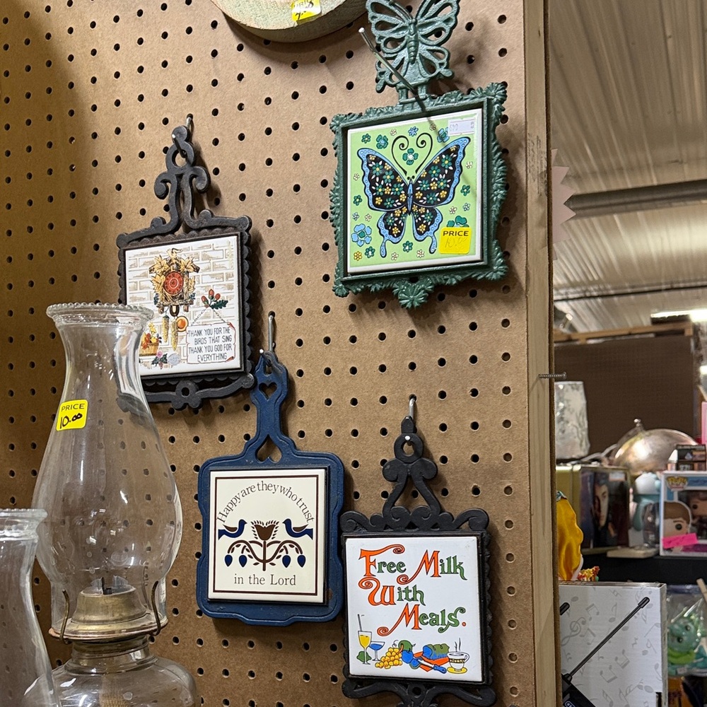 Vintage cast iron trivets with Butterfly